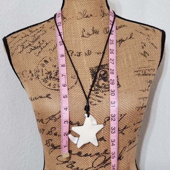 Brushed silver tone metal  star and  moon on a black cord staement necklace - Picture 4 of 4
